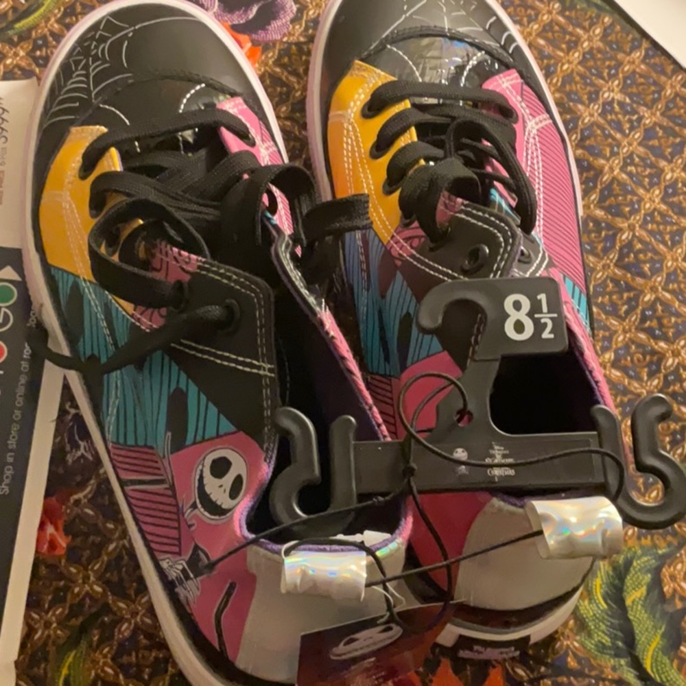 New with tags, size 8.5, highDisney Black and Pink Sneakers with Artistic Design